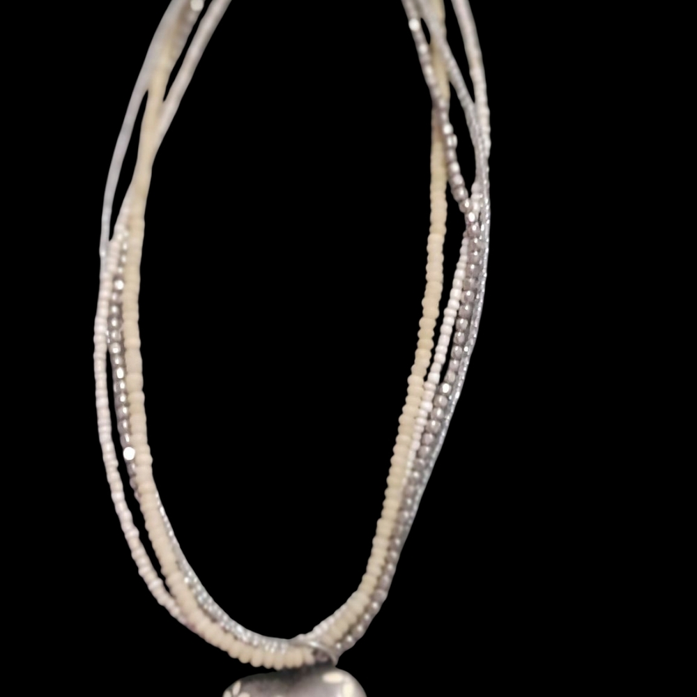 Elegant Silver and Cream Beaded Necklace